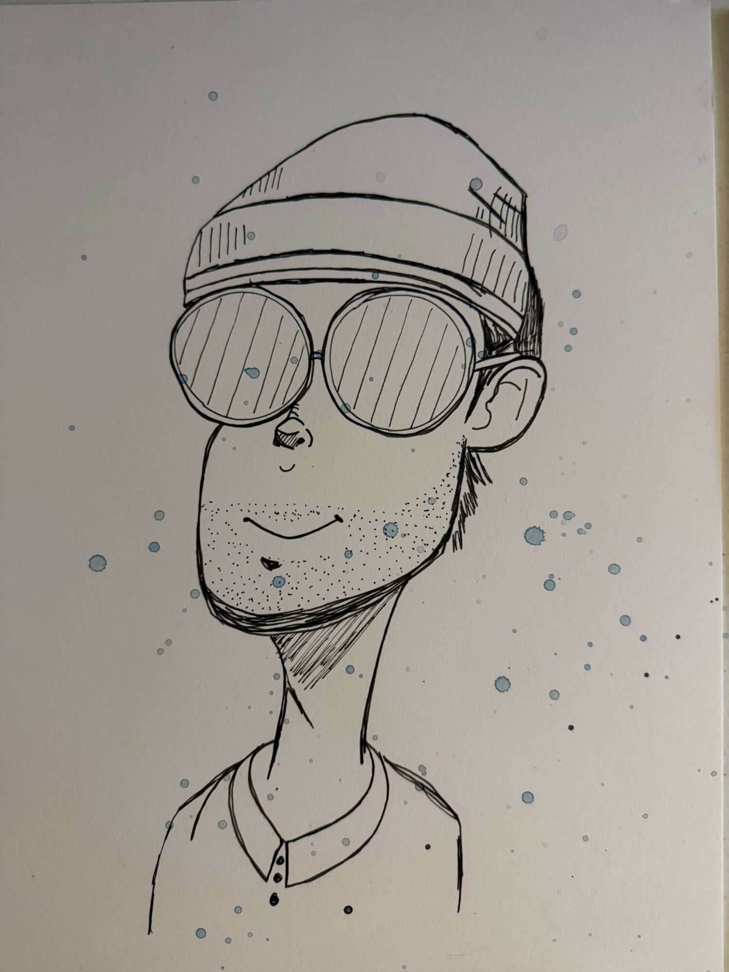 Line drawing of a person wearing a beanie and large sunglasses, with a slight smile and a collared shirt.