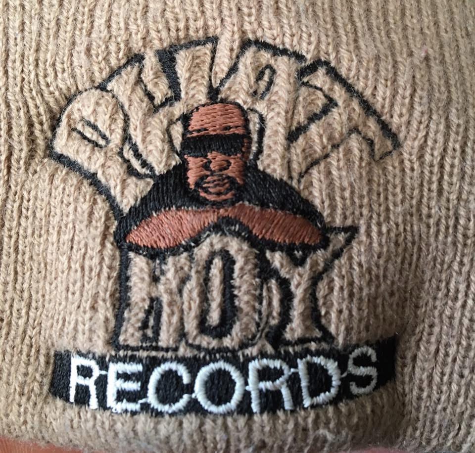 Embroidery patch with a person's face, text 'DUTCH' above, 'LOY' below, and 'RECORDS' at the bottom.
