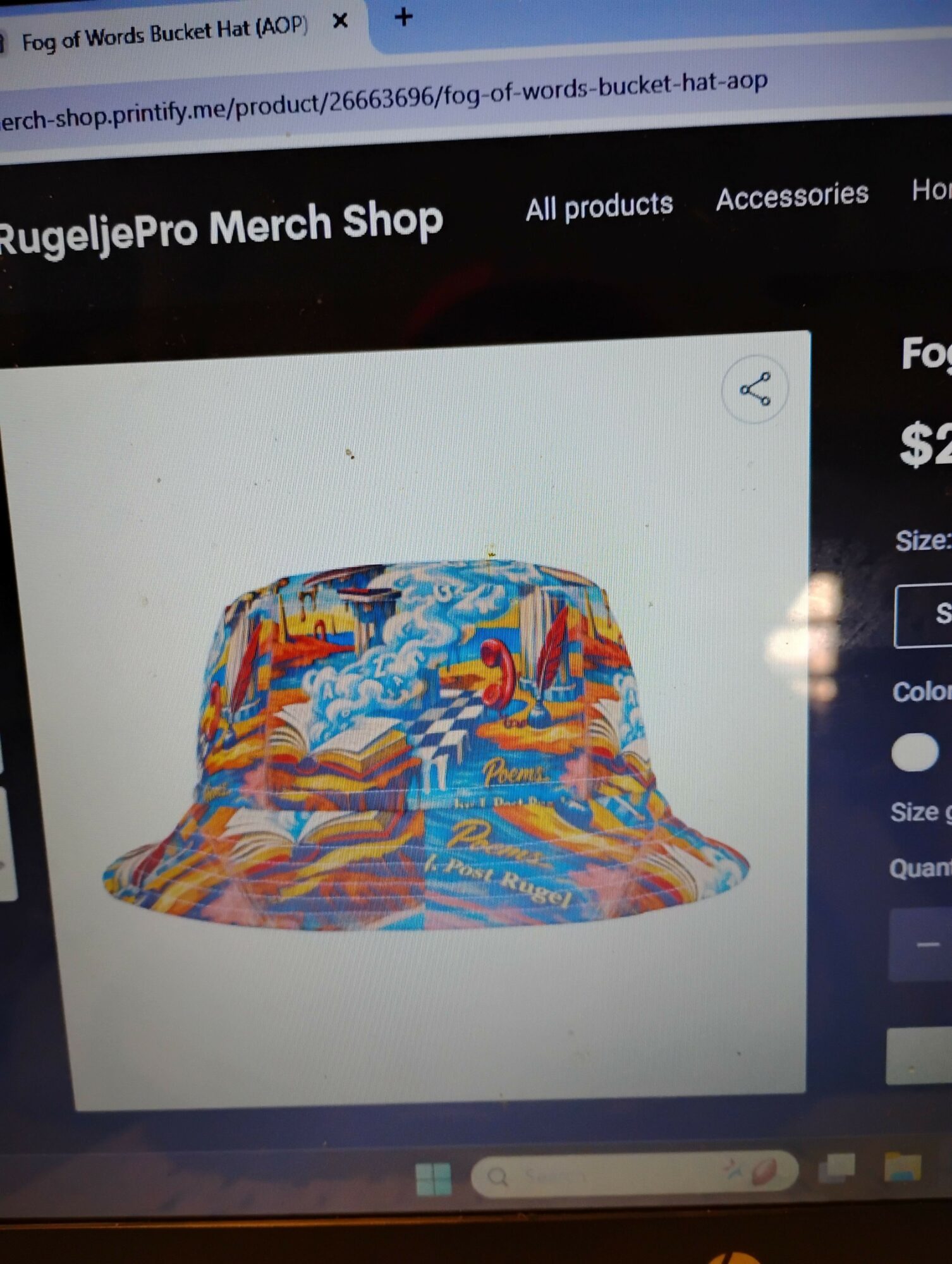 Colorful abstract pattern on a fabric or textile item, displayed on a screen.