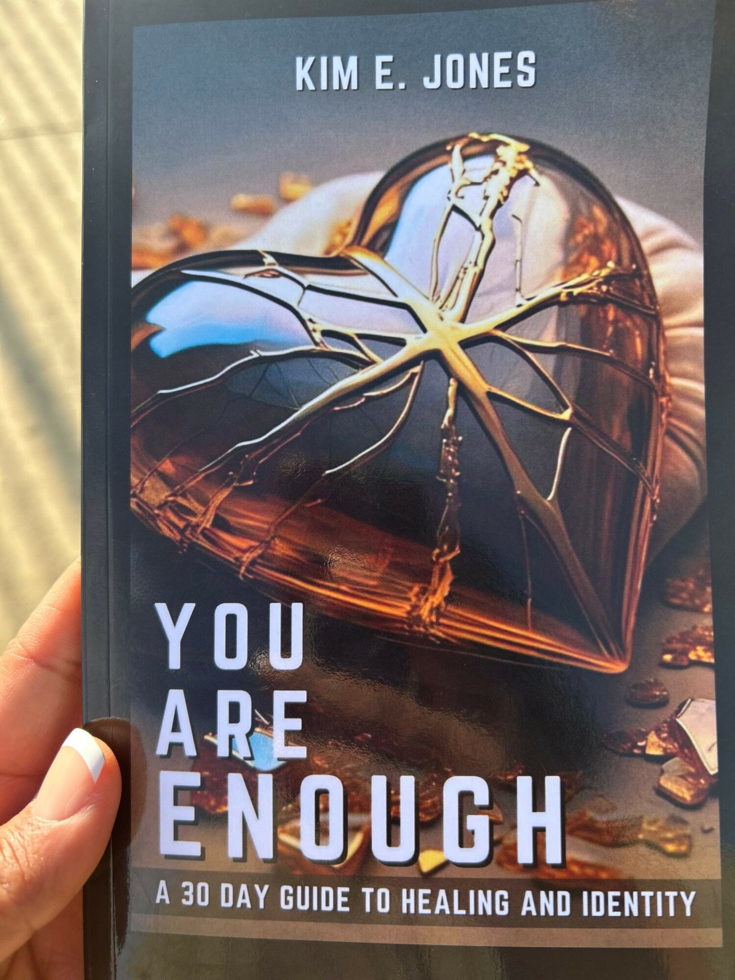 Book cover with a cracked glass of whiskey and lightning, titled 