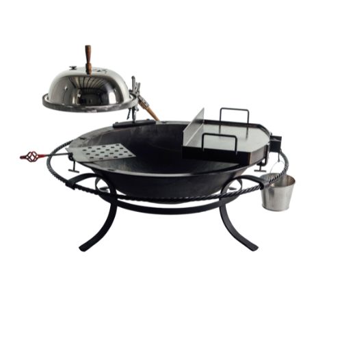 A black outdoor fire pit with a metal lid, a grilling surface, and a small side bucket, on a stand.