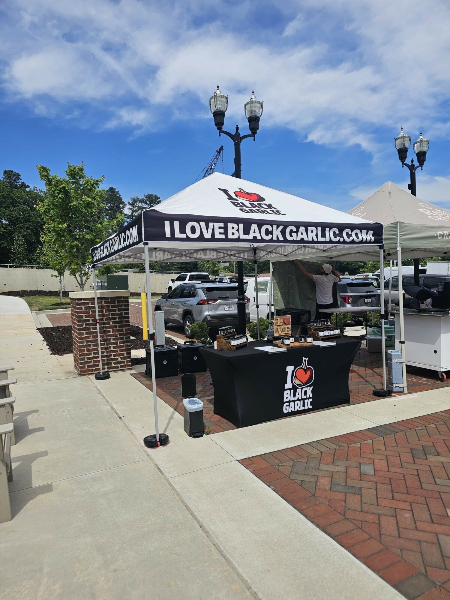 Outdoor tent with a banner reading 