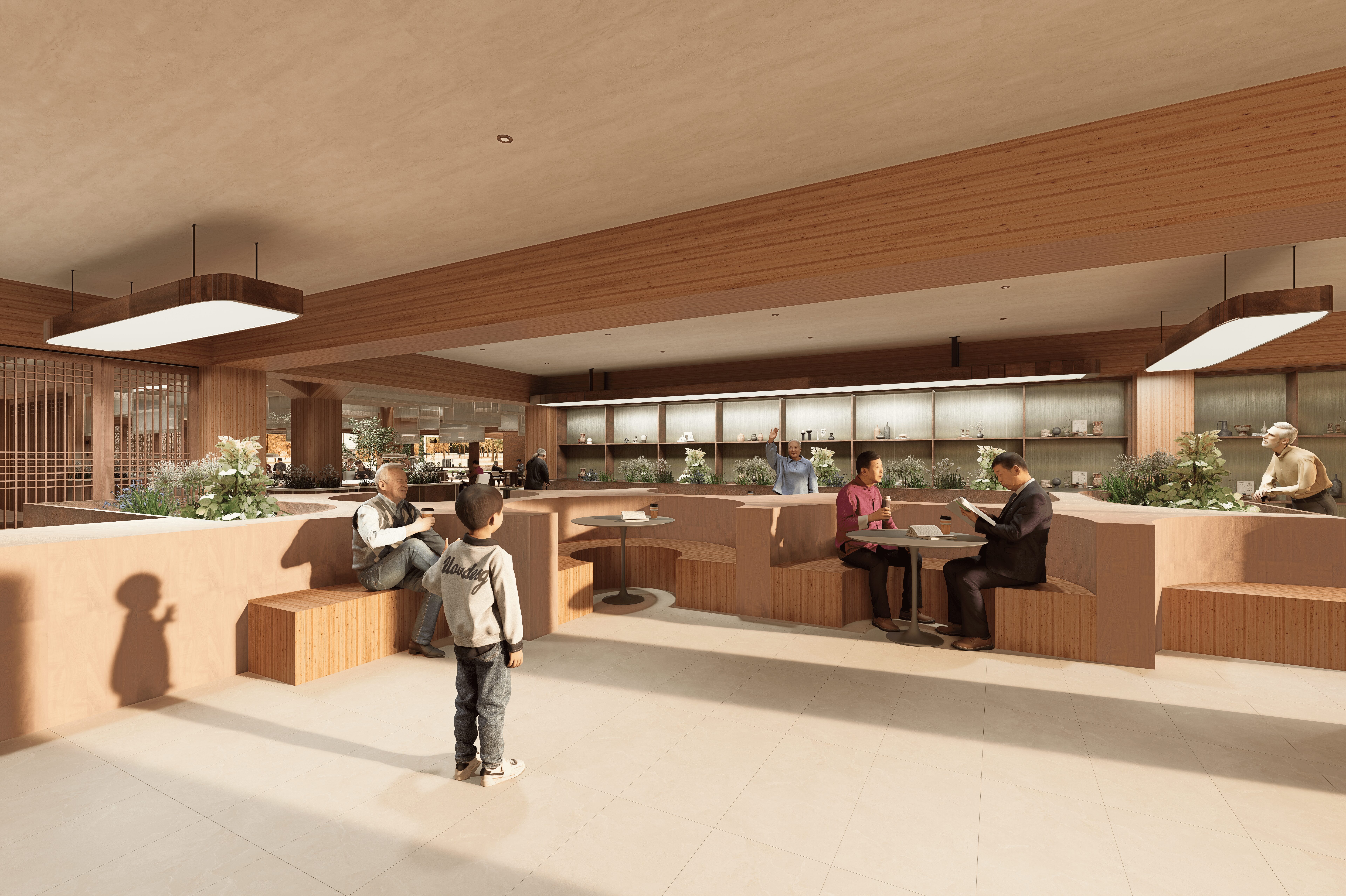 Children and adults sit and stand in a modern, open indoor space with wooden accents and seating areas.