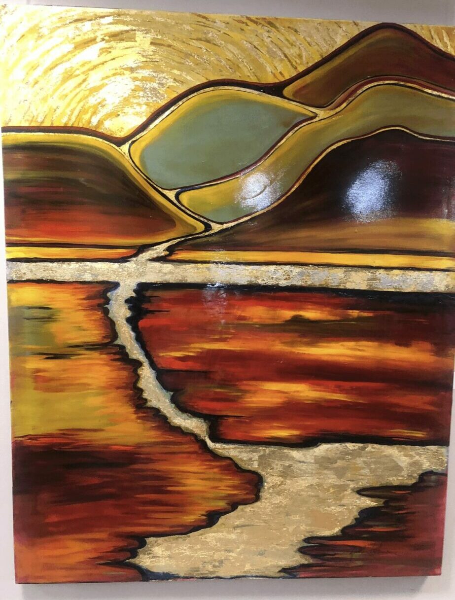 Abstract landscape with golden, brown, and cream colors, resembling mountains and water reflections, with a textured appearance.