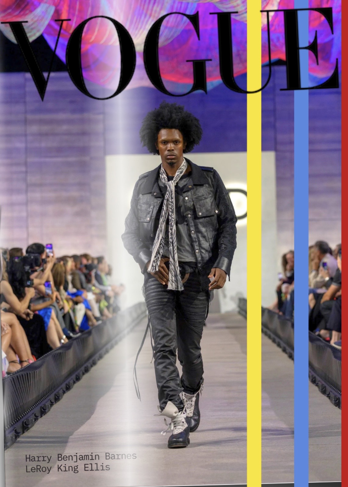 Model walking on runway with audience on both sides, large 'VOGUE' sign above, colorful background, wearing denim jacket and pants.