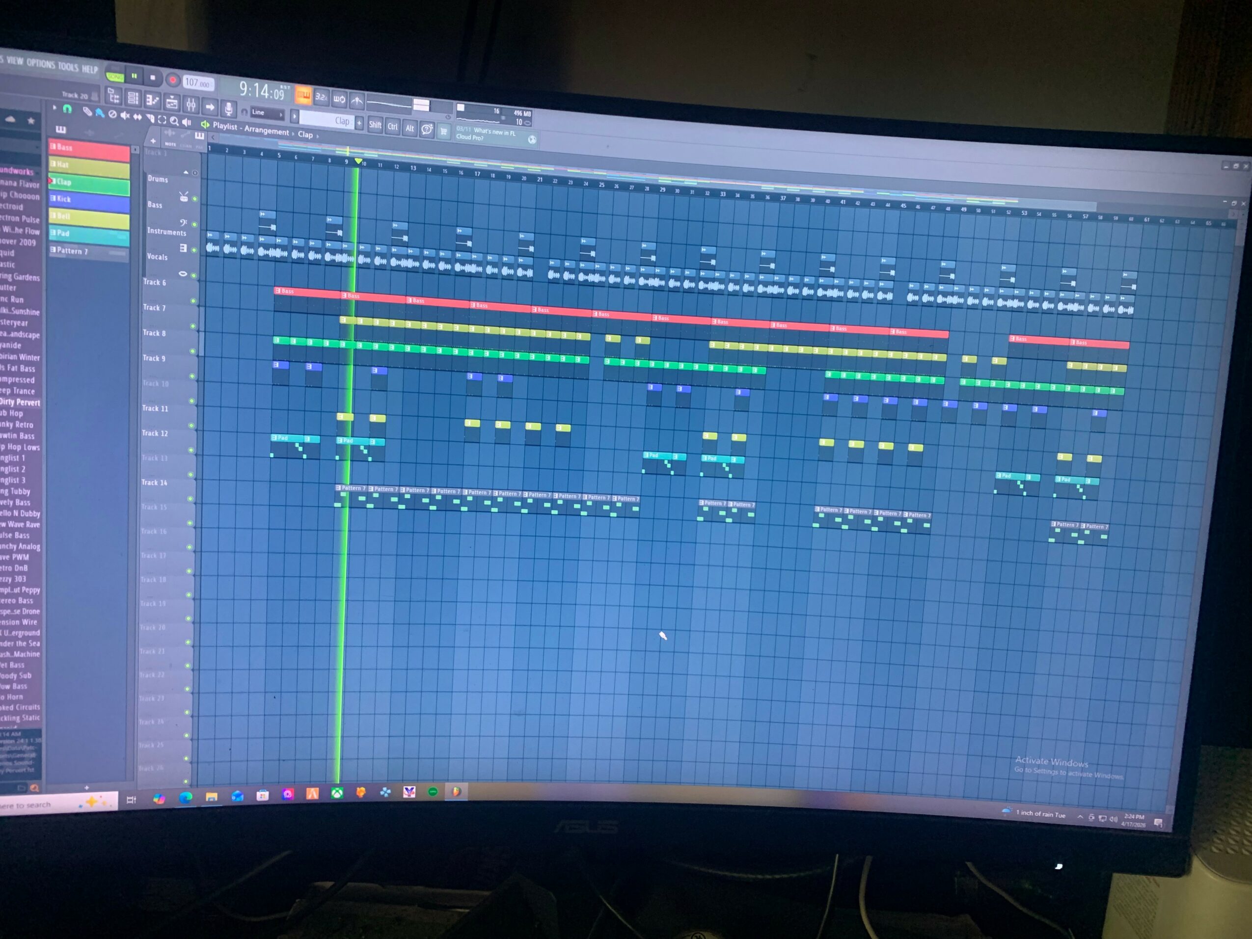 Computer screen displaying a music production software with a digital audio workstation interface and colorful tracks.