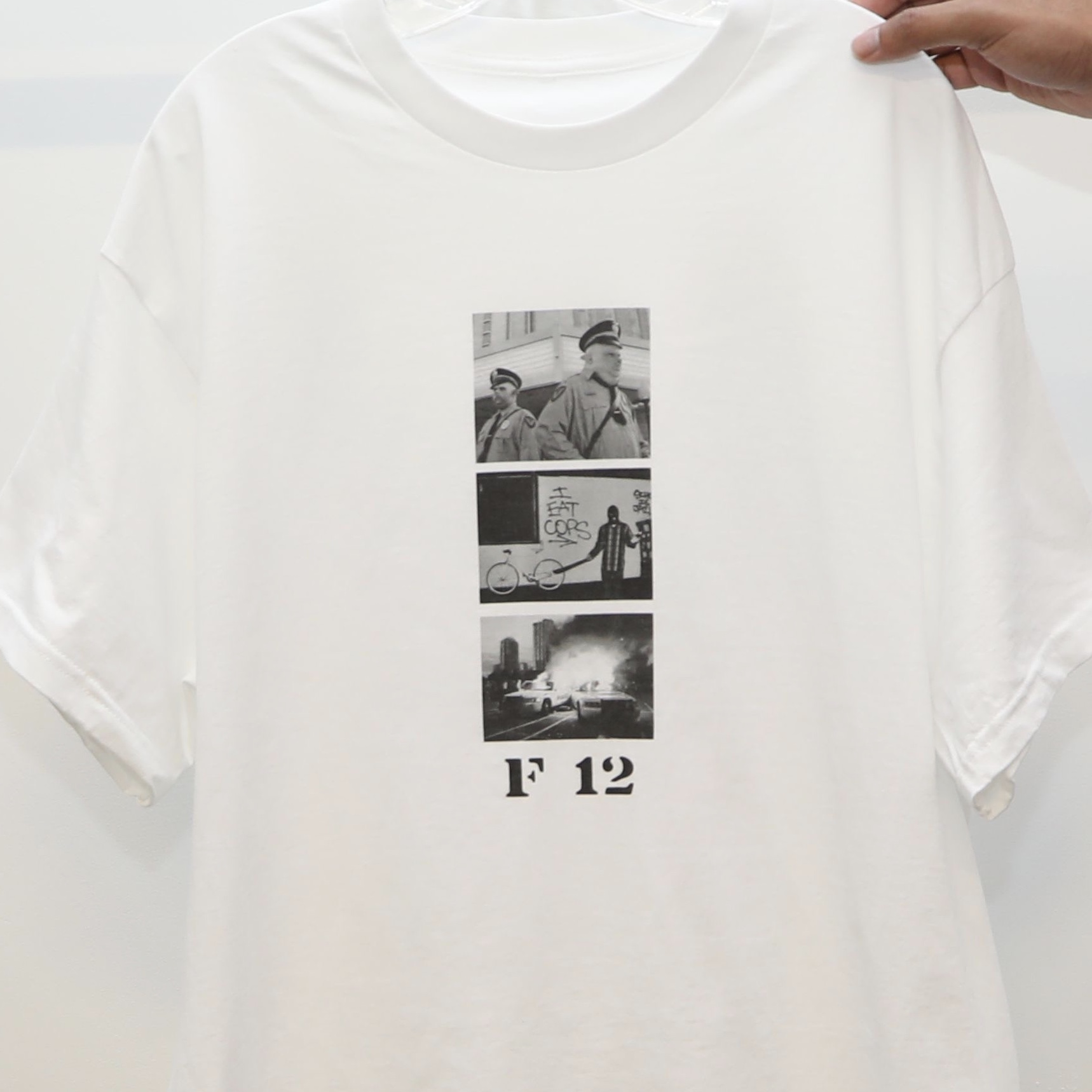 White T-shirt with three black-and-white photos and the text 'F 12' below.