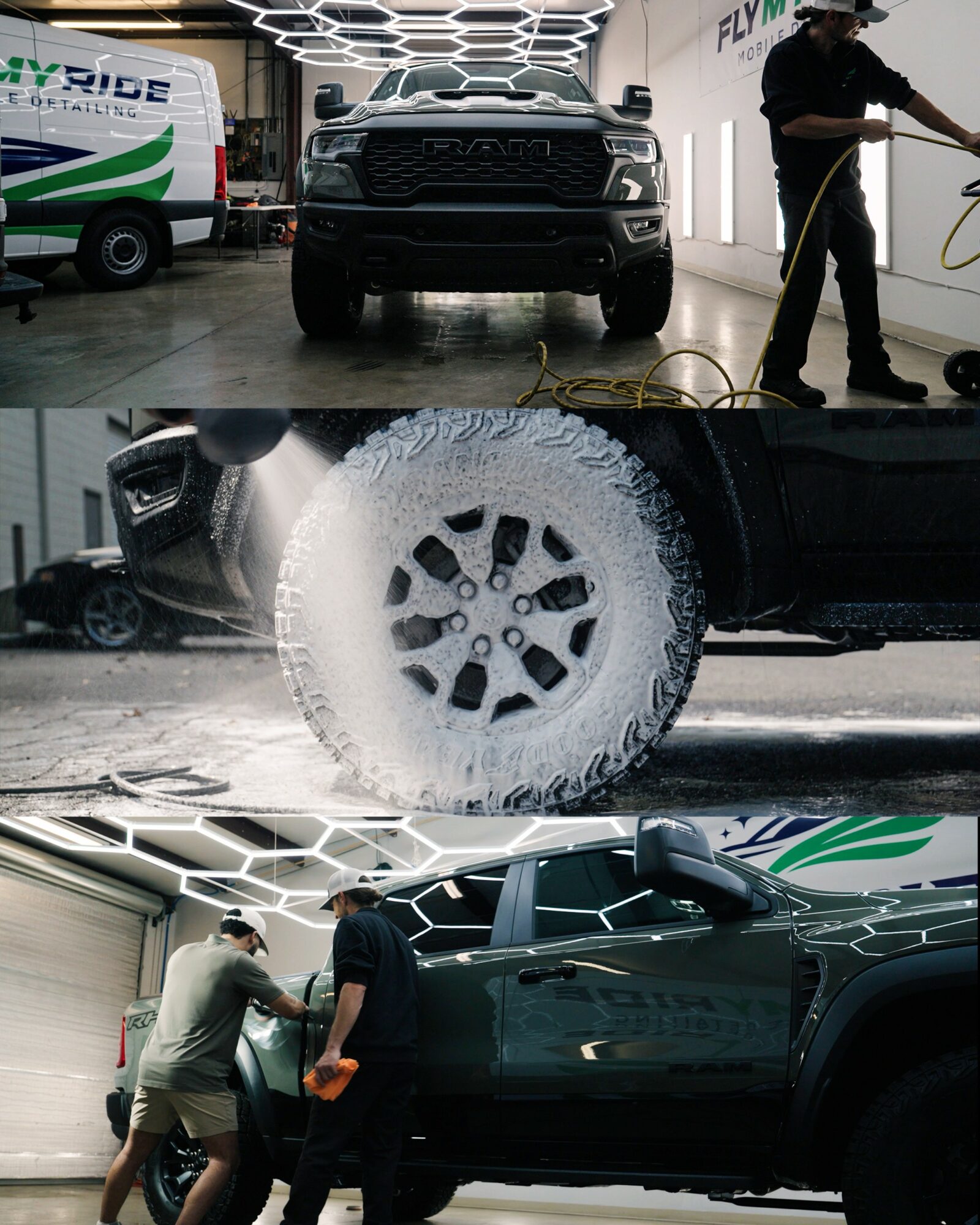 Two people wash a dark green pickup truck inside a garage, with a black vehicle and a person cleaning in the background.