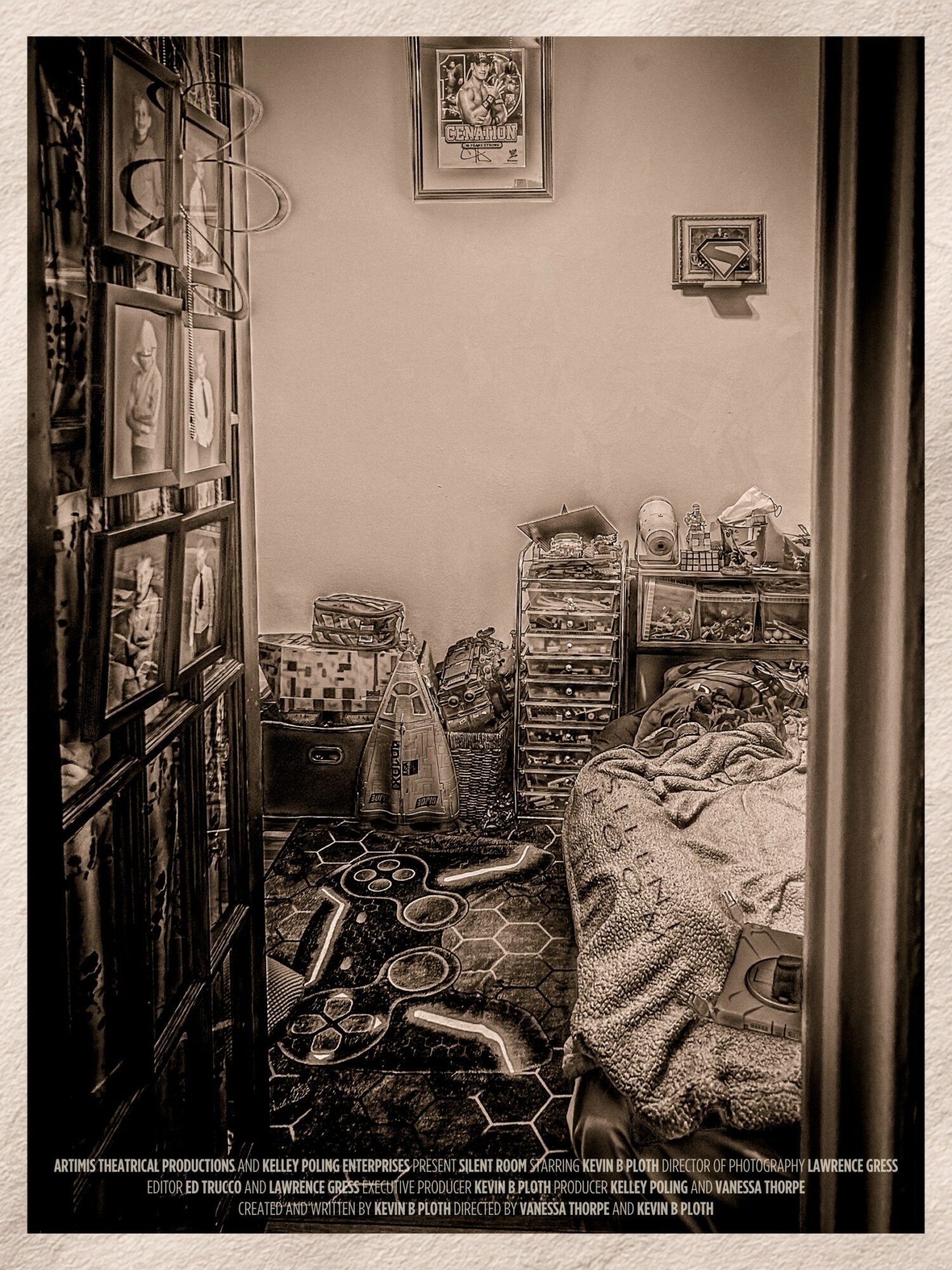 Room with shelves, a bed, and various objects, viewed from doorway, in black and white.