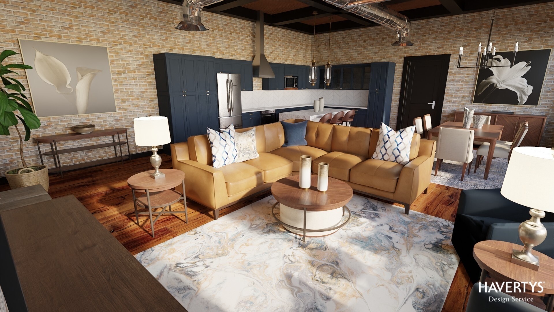 Living room with two yellow sofas, side tables with lamps, a round coffee table, and a large area rug.