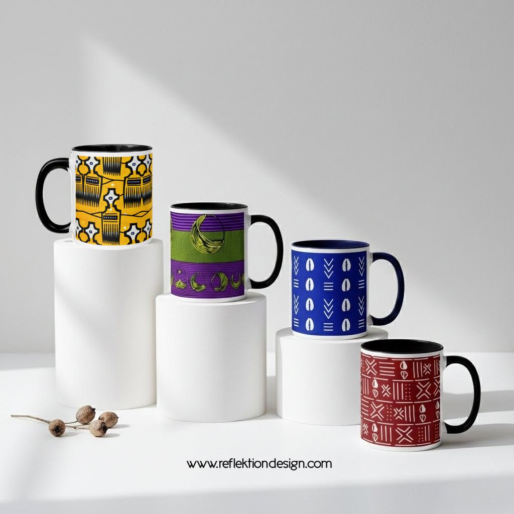 Four colorful mugs with patterns on white cylindrical stands, with small decorative objects in front, against a plain background.