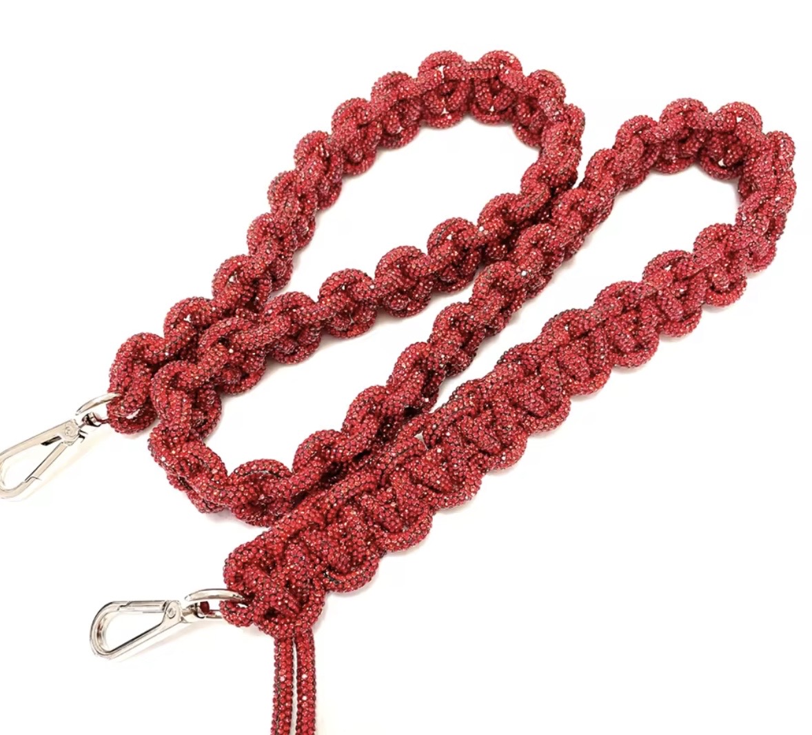 Two red beaded lanyards with metal clips, one longer and one shorter, on a white background.