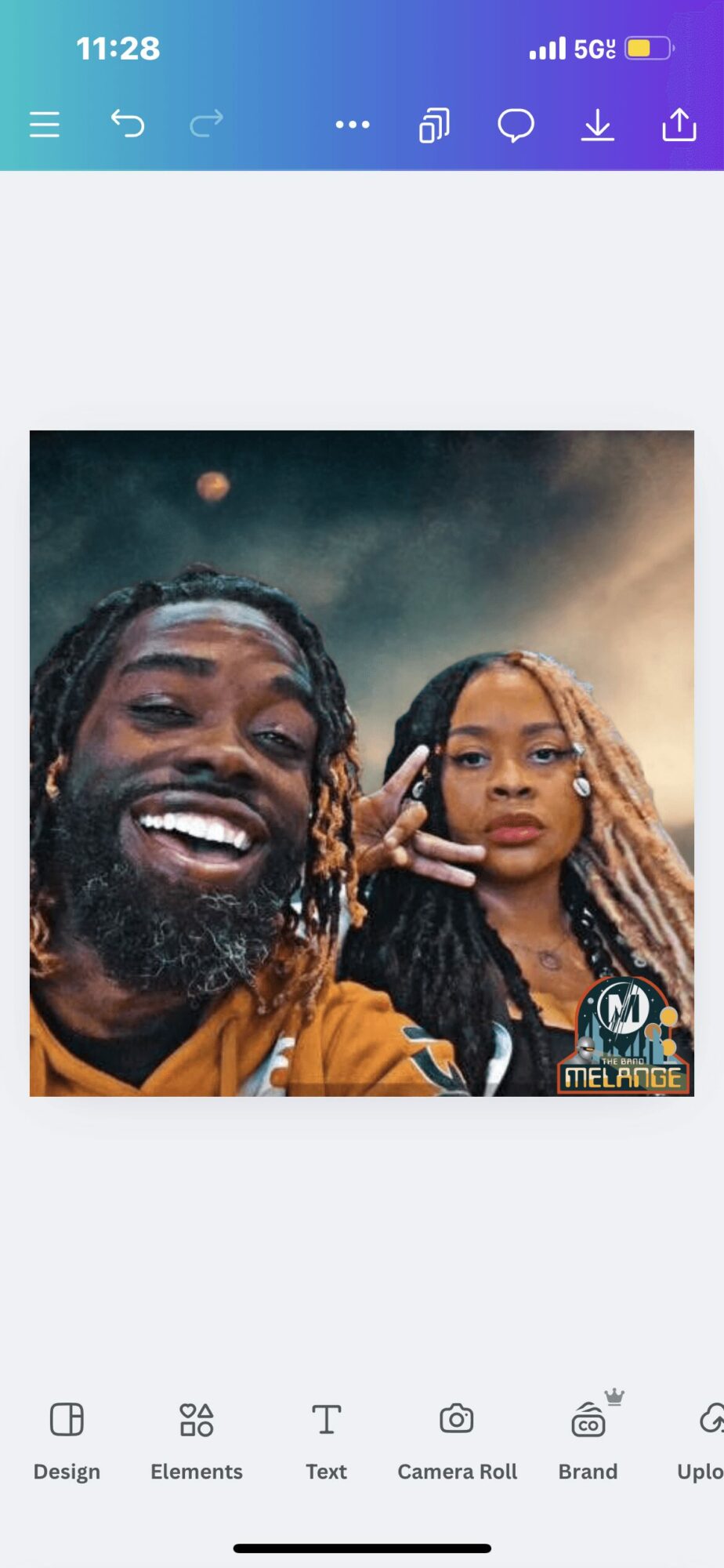 Two people with dreadlocks smiling and making a peace sign, outdoors at night with a moon in the background.