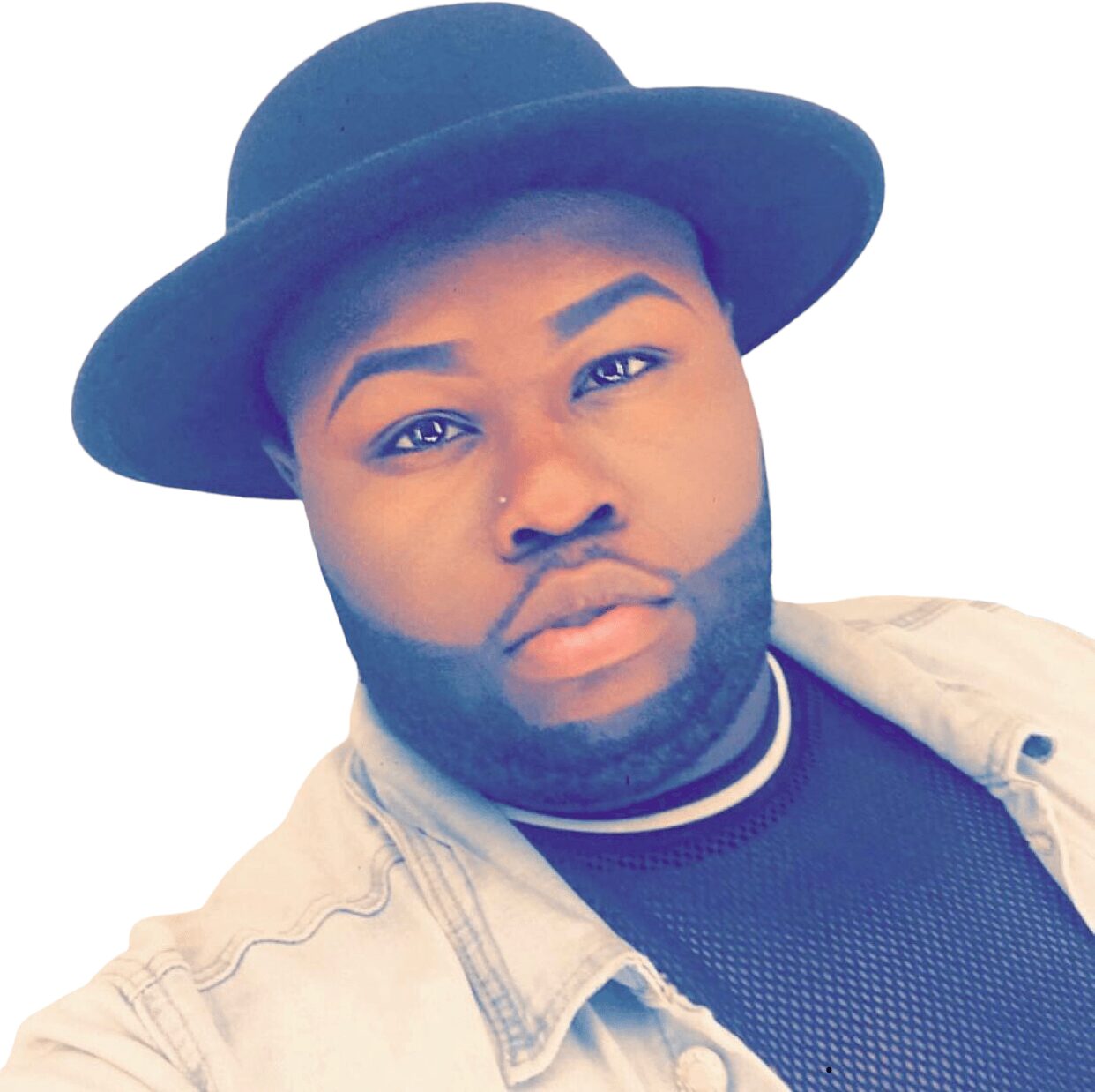 Portrait of a person wearing a wide-brimmed hat, with a beard, looking directly at the camera, against a white background.