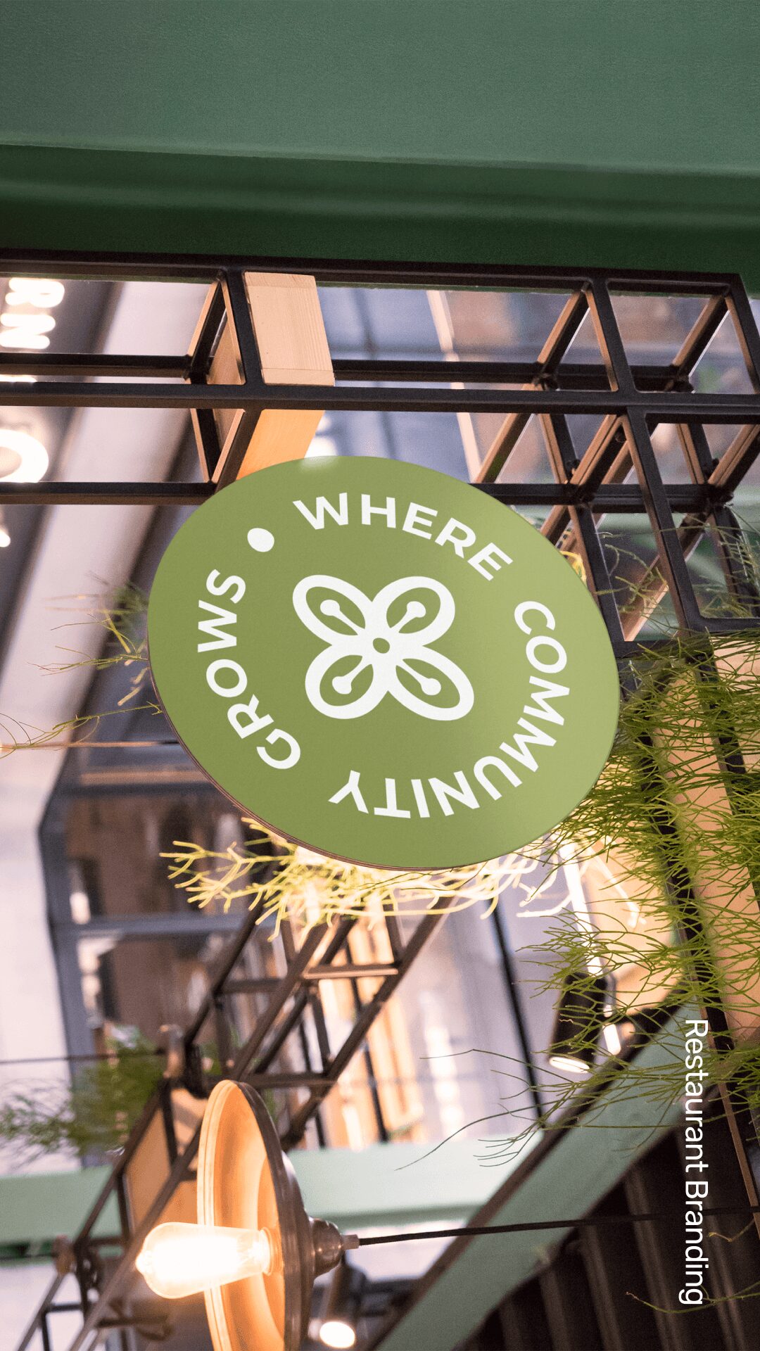 Green circular sign with white text and logo reading 'Where Community Grows' inside a building.