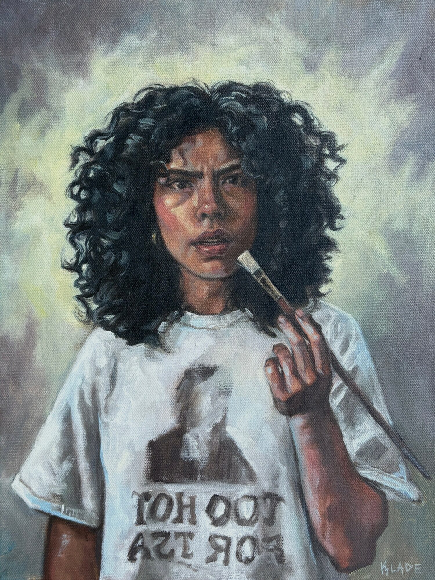 A woman with curly hair holding a knife, wearing a white shirt with a torn logo, against a cloudy background.