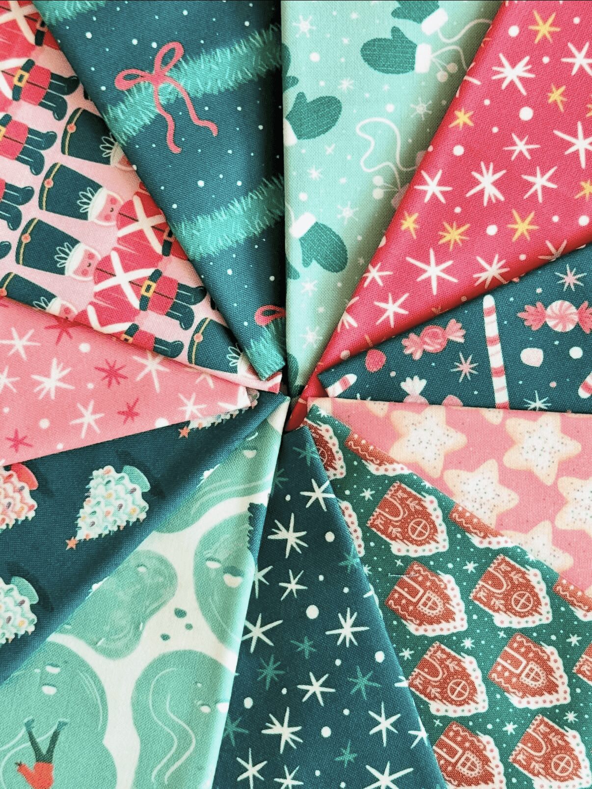 Colorful fabric swatches with holiday and winter patterns, arranged in a circular fan shape.