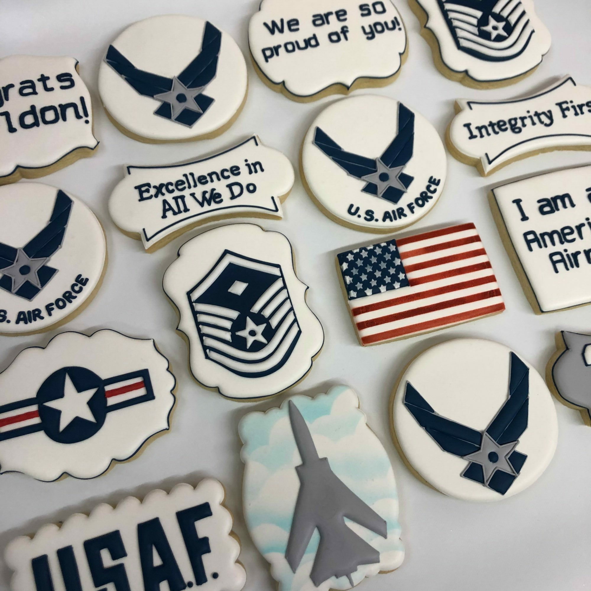 Collection of military-themed stickers including aircraft, flags, and emblems, with some featuring patriotic symbols and slogans.