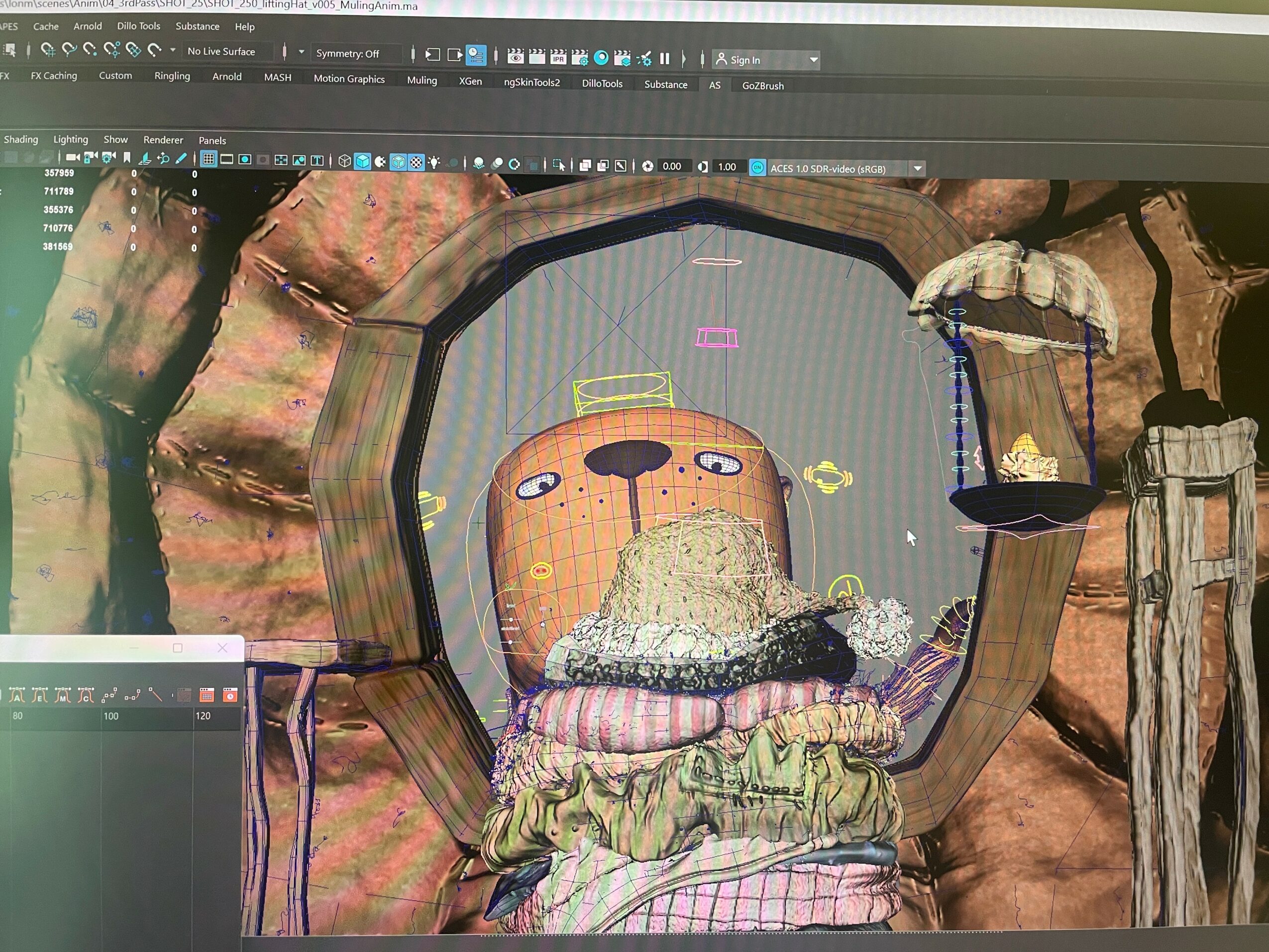 Computer screen displaying a 3D model of a bear's face with a textured background and various modeling tools.