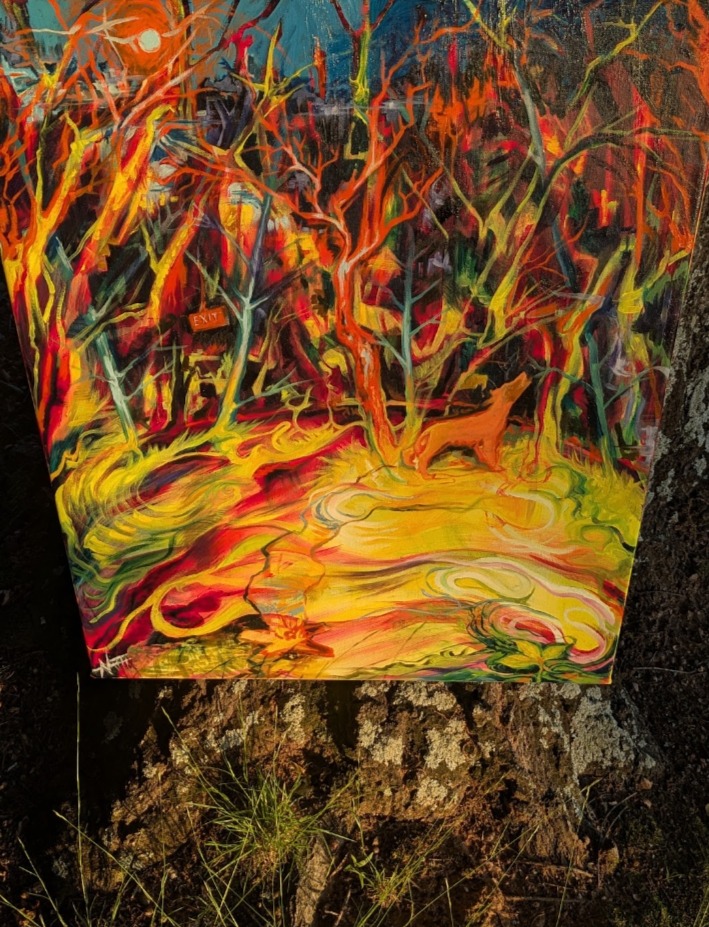 Colorful abstract painting with fiery reds, oranges, and yellows, resembling a forest scene with swirling patterns and vibrant colors.