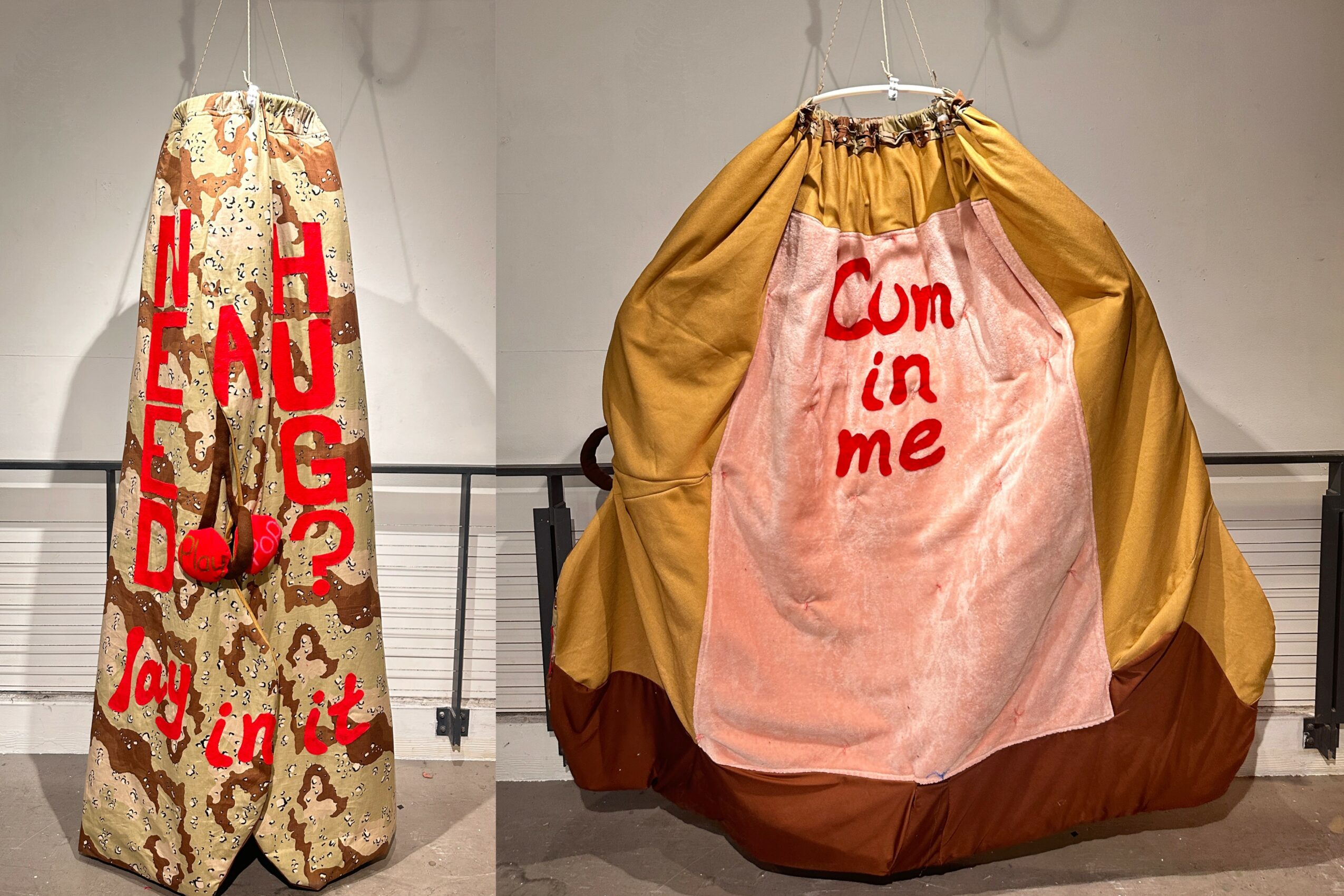 Two skirts hanging; one with a floral pattern and red text, the other with a pink and yellow fabric and red text.