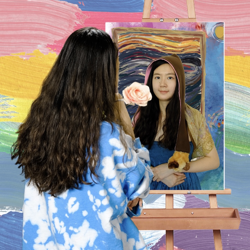 Two young women in front of colorful abstract paintings, one holding a pink flower, the other looking in a mirror.