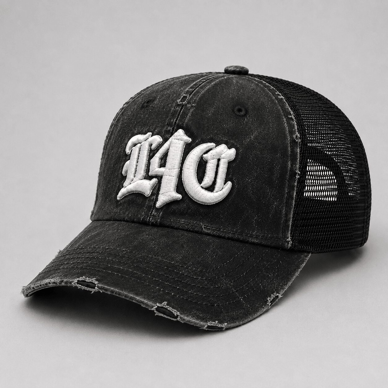 Black distressed baseball cap with white embroidered text '140' on front, mesh back, and curved brim.
