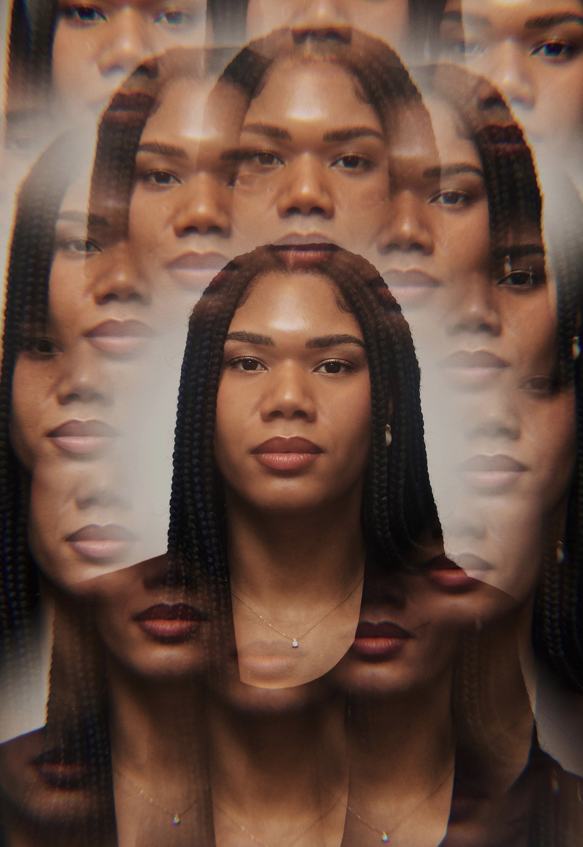 Multiple overlapping images of a woman with braided hair and neutral expression, creating a layered effect.
