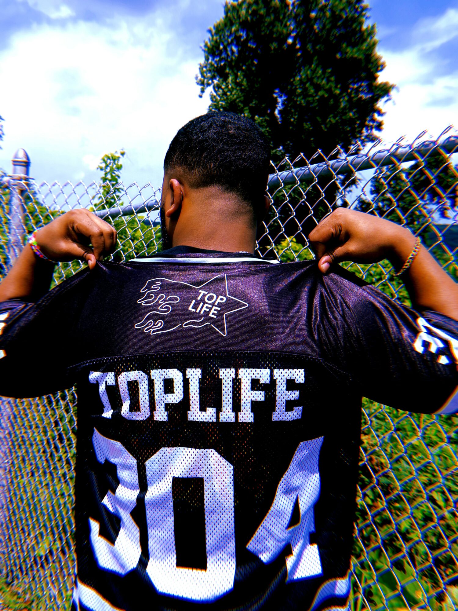 Person showing back with black shirt,