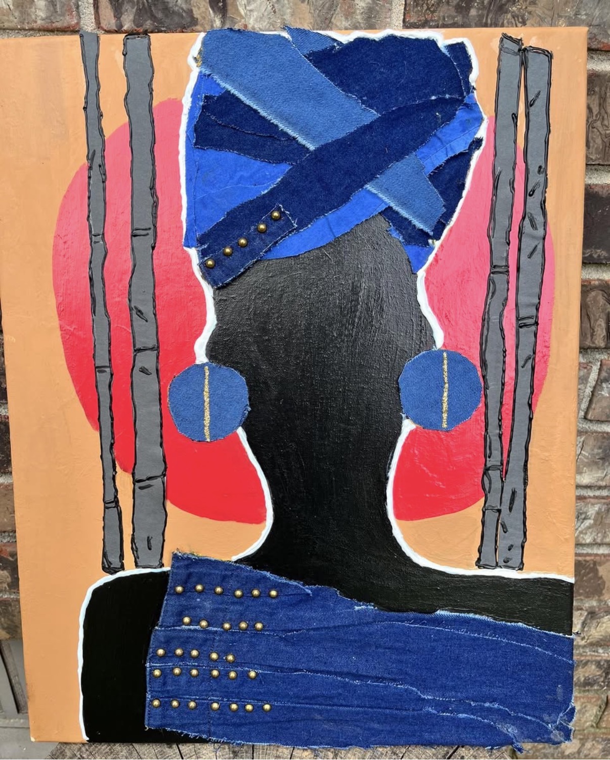 Abstract portrait of a person with a black face, blue headscarf, and large blue earrings, against a red and pink background.