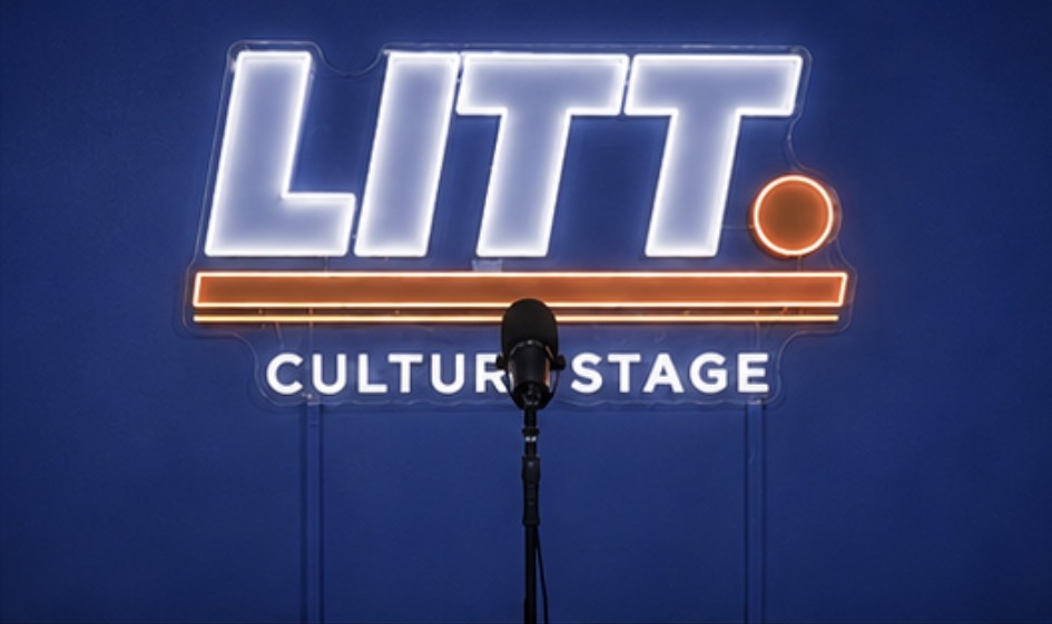 Stage with illuminated sign reading 'LITT.' and 'CULTURE STAGE' below, with a microphone in front.