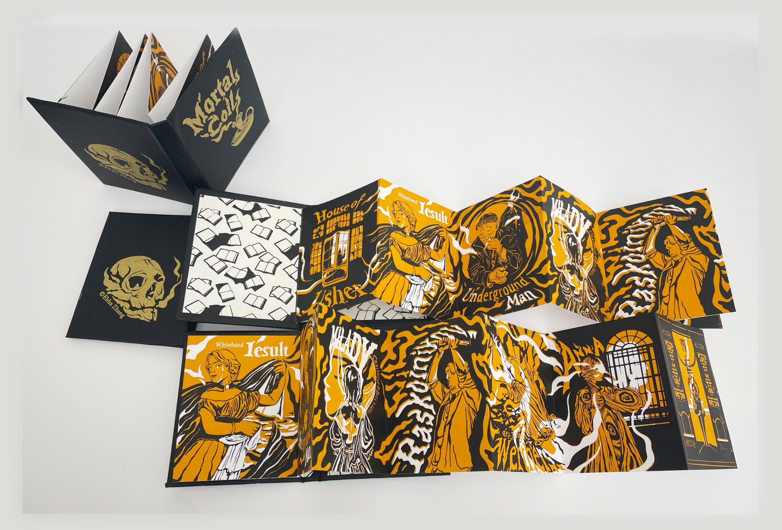 Open fold-out booklet with black and yellow tiger illustrations and skull design, displayed on a white surface.