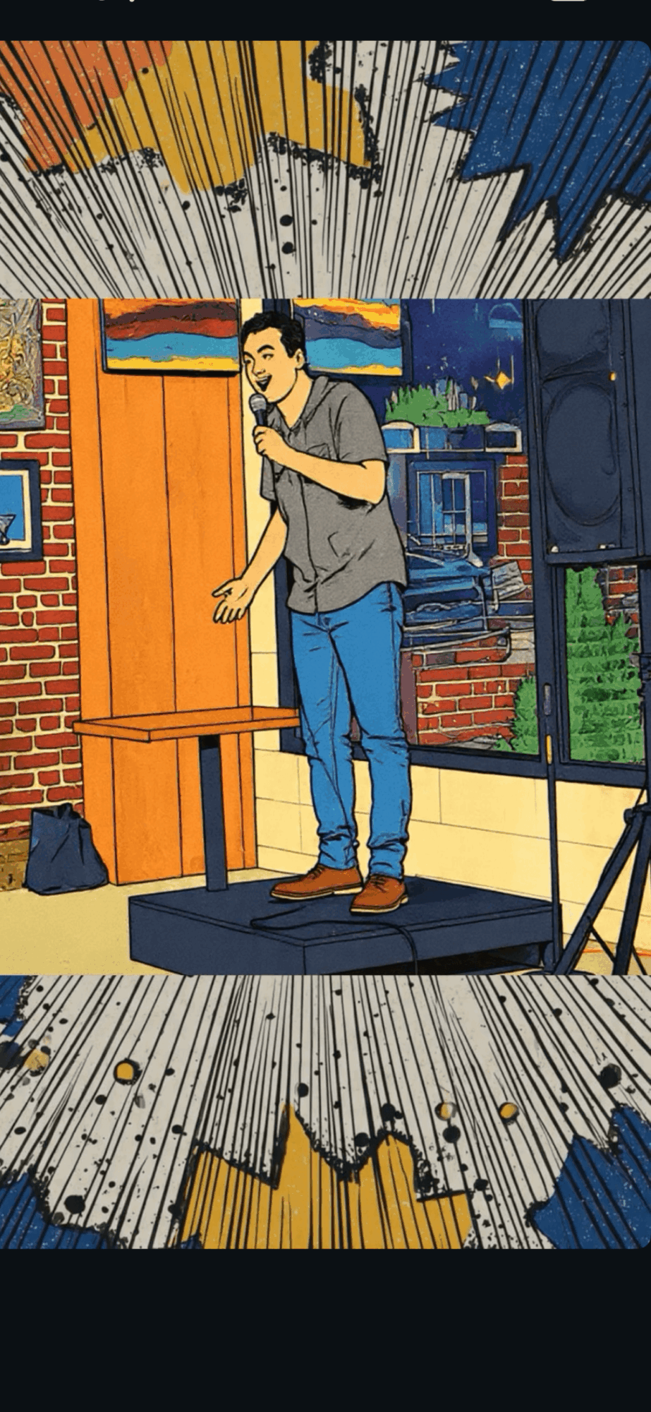 Person standing on stage with microphone, in front of brick wall and colorful artwork, holding microphone with one hand.