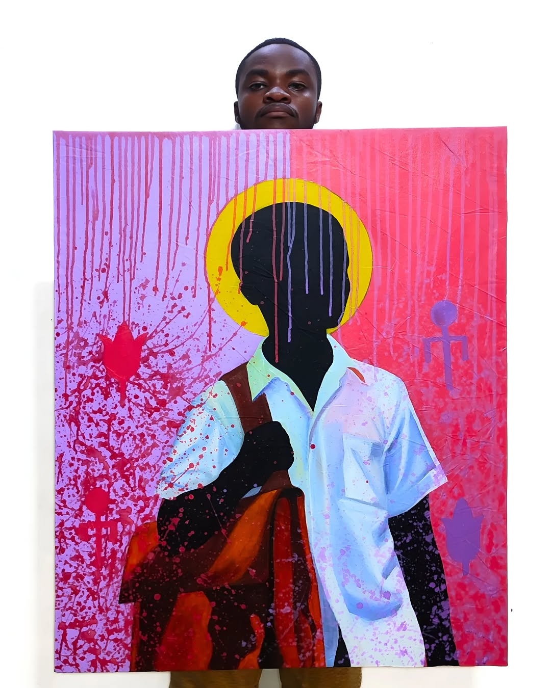 Person holding a colorful painting with a silhouette of a figure with a halo, against a white background.