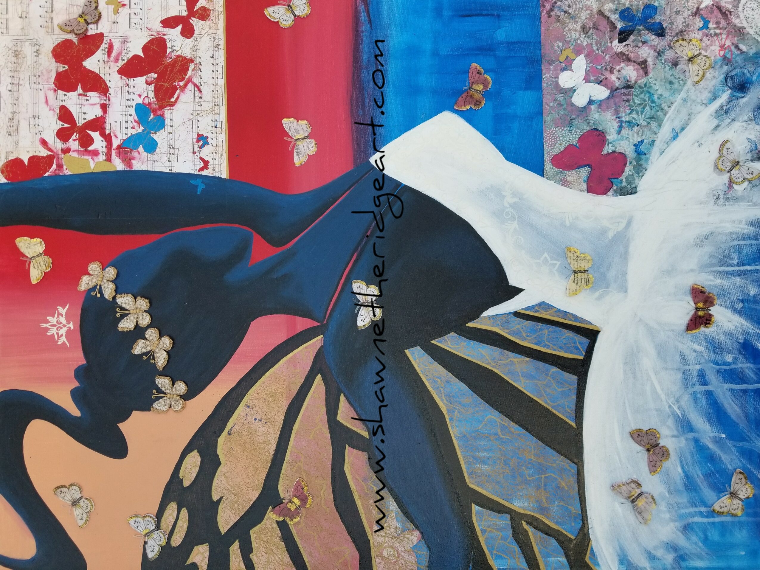 Colorful fabric with butterflies and floral patterns, some draped and layered, with a white and blue section. Numerous butterflies are scattered.