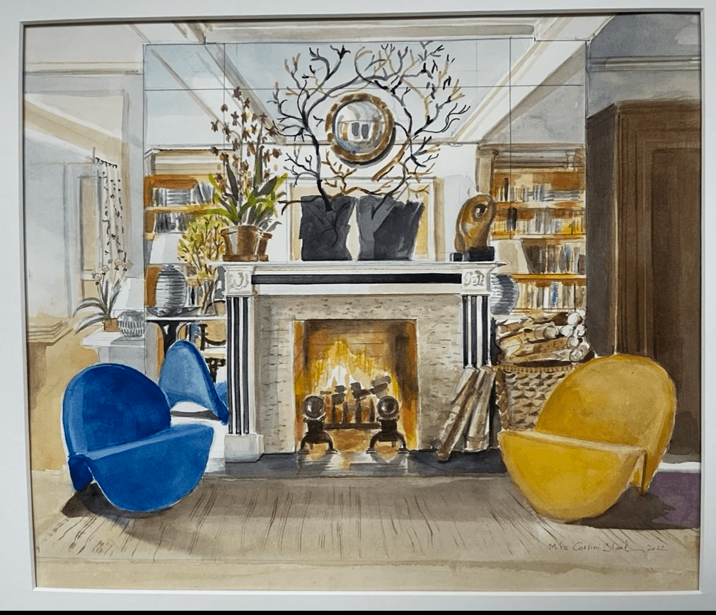 Living room with fireplace, blue and yellow chairs, bookshelves, and decorative items, including a mirror and plants.
