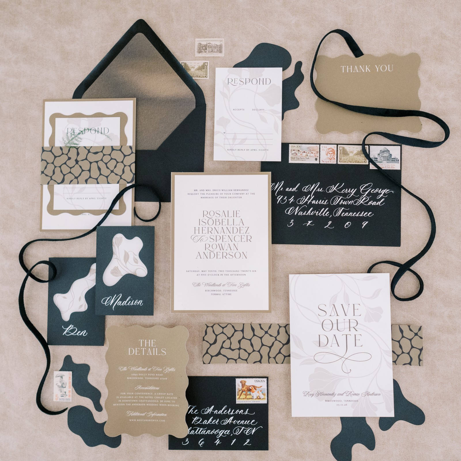 Collection of wedding stationery including invitations, RSVP cards, thank you notes, and decorative elements in black, white, and beige.