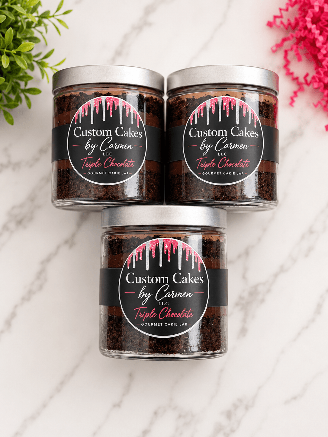 Three jars of cake mix labeled 