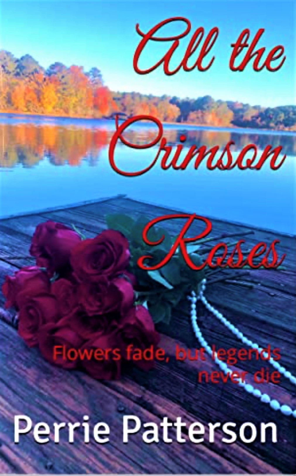 A book cover with a lake, trees, and a dock with red roses and a pearl necklace, titled 'All the Crimson Roses'.